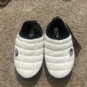 The North Face slippers new with tags.